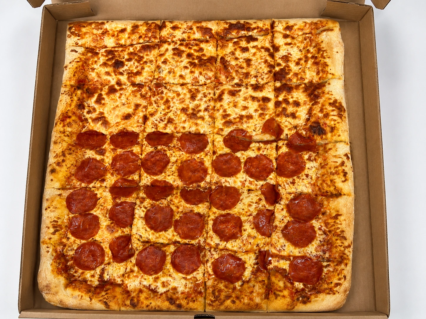 Fresh pizza and chicken wings at Ancaster Pizza in Ancaster, Ontario